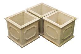 A set of three stone composition planters, by Haddonstone, modern; of square section,
