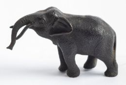A Continental patinated bronze model of an elephant,