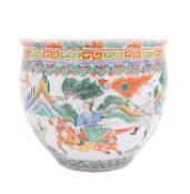 A Chinese famille verte small fish bowl the interior decorated with carp swimming amongst water