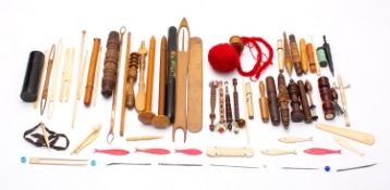 A collection of needlework and sewing accoutrements,