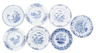 Two pairs of Chinese blue and white plates and three others,
