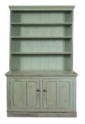 A green painted pine dresser in early 19th century style,