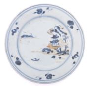 A Chinese Nanking Cargo porcelain plate, painted in blue with a lakeside temple, 23cm diameter,