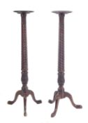 A pair of Victorian mahogany torchere or vase stands, in Regency style,