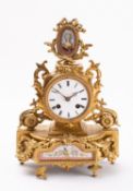 A mid-Victorian French gilt-metal and porcelain mantel clock the eight-day duration movement