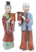 A pair of Chinese famille rose figural candleholders,