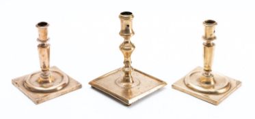 Two similar brass candlesticks, probably Spanish,