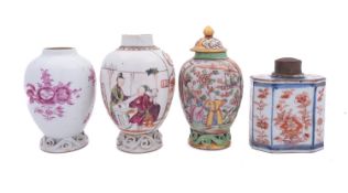 A group of four Chinese tea caddies, Qianlong one painted in pink monochrome with flower sprays,