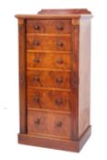 A Victorian collectors walnut Wellington chest, with a ledge back,