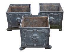A set of three lead garden planters, in early 18th century taste, modern; of square section,