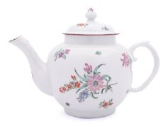 A Champion's Bristol globular teapot and cover with bud finial and acanthus scroll handle,