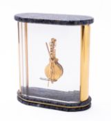 Jaeger-LeCoultre a Prisma mantel clock the in-line movement having a jewelled lever escapement with