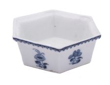 A Plymouth blue and white hexagonal hors d'oeuvres dish each side painted with a flower sprig,