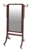 A late 19th Century mahogany and inlaid swing frame cheval mirror, bordered with boxwood lines,