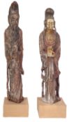 A pair of large Chinese polychrome painted carved wood figures in Ming Dynasty style of male and