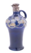 A Royal Doulton silver-mounted stoneware flask and stopper tube lined in the Art Nouveau manner