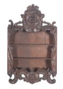 A set of French oak hanging shelves,