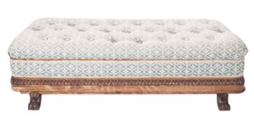 A Victorian rosewood ottoman window seat, of angled design,