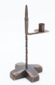 A wrought iron and ebonised softwood mounted rushnip,