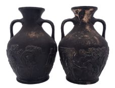 Two black painted terracotta Portland vases both marked 'N&H 68', 22cm [minor damage].