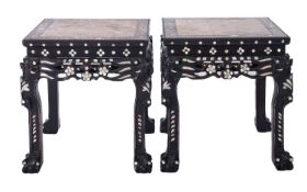 A pair of Chinese carved hardwood and mother of pearl inlaid square urn tables,