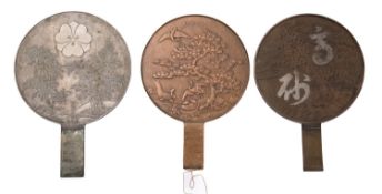 A group of three Japanese bronze mirrors, 20th century cast with cranes, characters,
