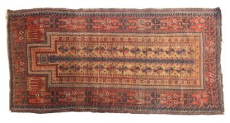 An Antique Belouchistan prayer rug, the geometric camel mihrab with a tree of life design,