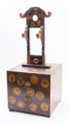 A Japanese black and gold lacquer sword stand [Katana-Kake], Meiji period,