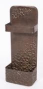 A repousse worked copper stick stand in Arts & Crafts style,