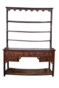 An early 19th Century oak dresser,