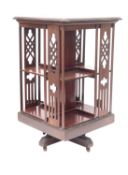 An Edwardian mahogany revolving bookcase,