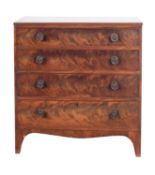 A Regency mahogany chest of drawers, circa 1815; the top with reeded edges,