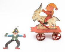 A Continental articulated painted metal toy in Victorian style, formed as a gnome riding a goat,