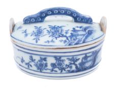 A Chinese 'Nanking Cargo' blue and white oval butter dish and cover,