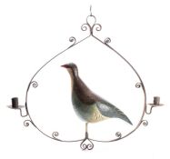 A wrought iron and painted metal twin light chandelier in north European folk art taste,