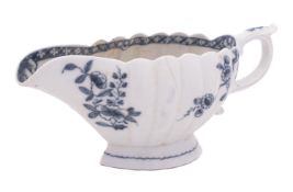 A Plymouth blue and white sauceboat of lobed form with raised foot,
