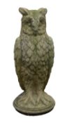 A stone composition garden model of an owl, probably cast by Haddonstone,