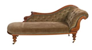 A Victorian carved walnut chaise longue,