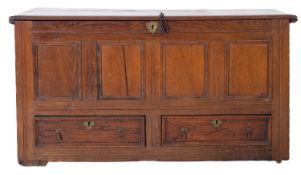 An early 18th Century oak dower chest, with a moulded rectangular top,