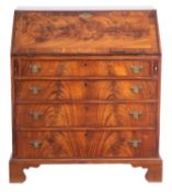 A George III mahogany and crossbanded bureau,