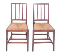 A pair of Edward VII Coronation chairs, by Glenister of Wycombe, in Arts & Crafts taste,