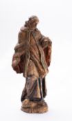 A Spanish carved, polychrome, parcel gilt and parcel silvered model of a male Saint,
