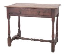 An early 18th Century oak rectangular side table, the top with a moulded edge,