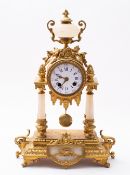 A French Victorian gilt-metal and alabaster mantel clock