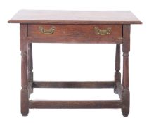 An 18th Century oak rectangular side table, the top with a moulded edge,