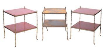 Two similar brass and red leather two tier square etagere, with pine cone finials,