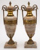 A pair of Continental striated onyx and gilt metal mounted twin handled urns,