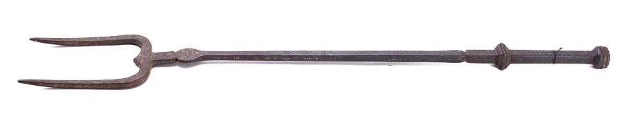 A steel log fork in 17th century taste,