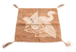 A Japanese silk embroidered and tasselled square panel,