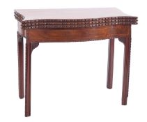 A George III mahogany and line inlaid combined tea and card table,